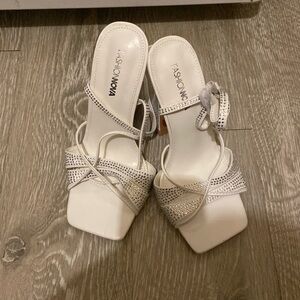 Brand new white heels embellished with silver